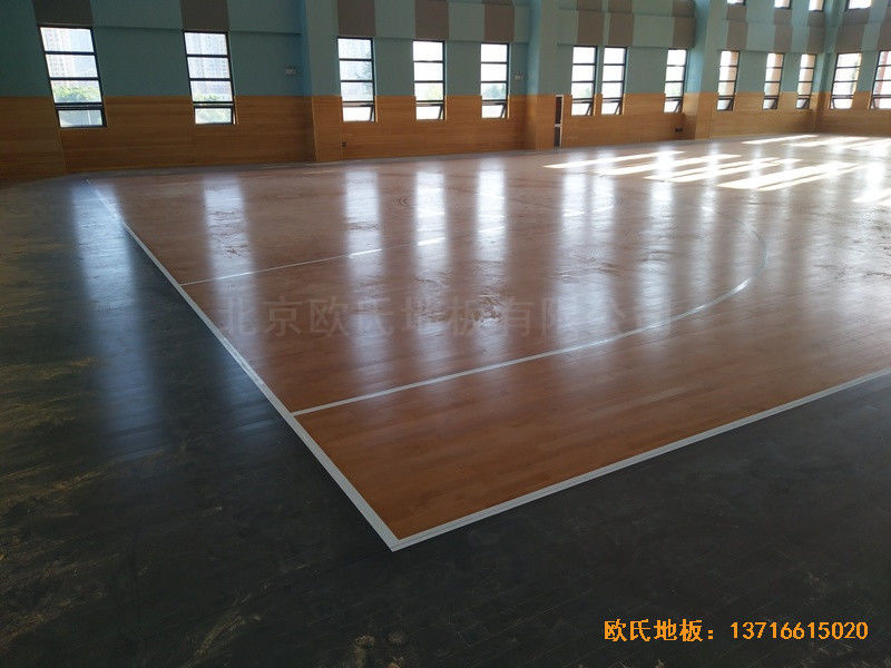 武漢廣阜屯小學(xué)清江錦城分?；@球館運動地板施工案例0