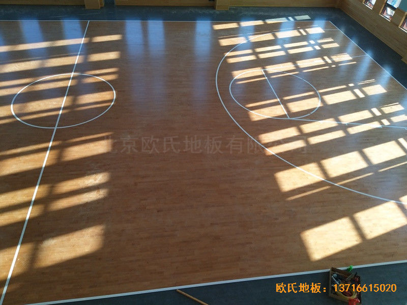 武漢廣阜屯小學(xué)清江錦城分?；@球館運動地板施工案例4